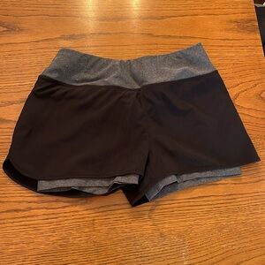 Short running short with spandex underneath